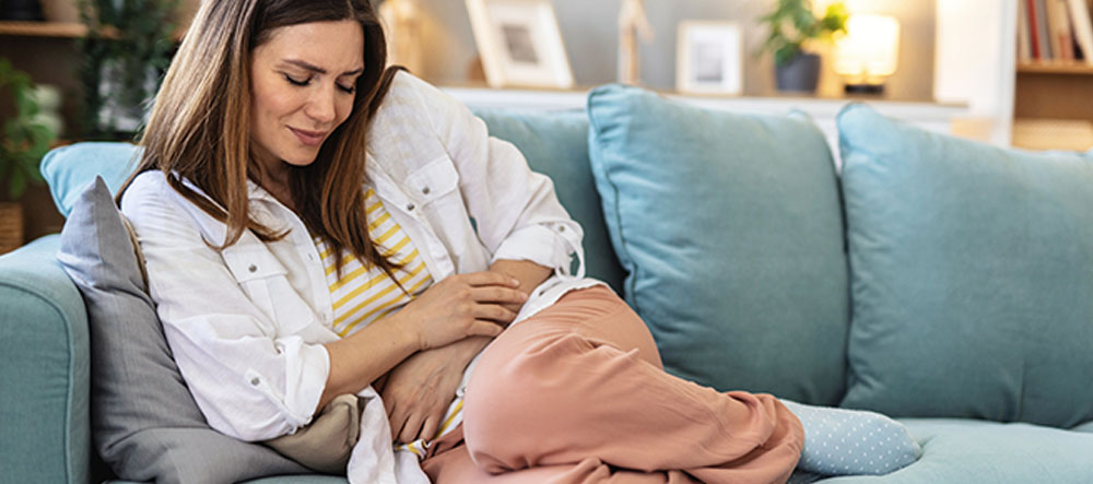 woman with abdominal pain in St. Louis due to pelvic congestion syndrome